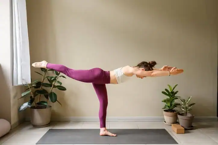 Woman doing Yoga exercise West Bridgford to help with toning the body. 