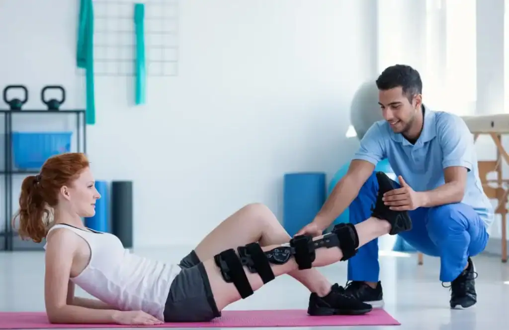 Woman having treatment to help muscle recovery West Bridgford after an injury
